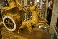 Empire style Chariot clock with Diana in gilded bronze, France around 1800