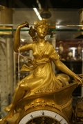 Empire style Chariot clock with Diana in gilded bronze, France around 1800