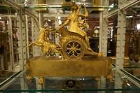 Empire style Chariot clock with Diana in gilded bronze, France around 1800