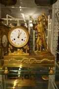 Empire style Clock in gilded bronze, France around 1800