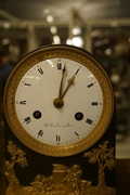 Empire style Clock in gilded bronze, France around 1800