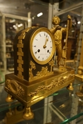 Empire style Clock in gilded bronze, France around 1800