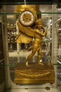 Empire style Clock in gilded bronze, France around 1800