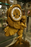 Empire style Clock in gilded bronze, France around 1800