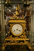 Empire style Clock in gilded bronze, France around 1800