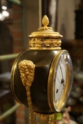 Empire style clock in gilded bronze, France 18th century