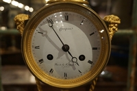 Empire style clock in gilded bronze, France 18th century