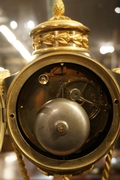 Empire style clock in gilded bronze, France 18th century