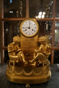 Empire style clock in gilded bronze, France 18th century