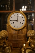 Empire style clock in gilded bronze, France 18th century