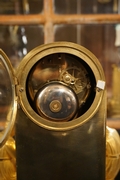 Empire style clock in gilded bronze, France 18th century