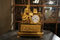 Empire style clock in gilded bronze, France 18th century