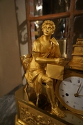 Empire style clock in gilded bronze, France 18th century