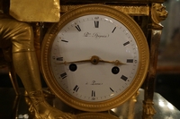 Empire style clock in gilded bronze, France 18th century