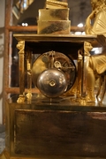 Empire style clock in gilded bronze, France 18th century