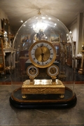 Empire style clock in gilded bronze, France 19th century