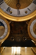 Empire style clock in gilded bronze, France 19th century