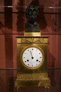 Empire style Clock in gilded and patinated bronze, France around 1800