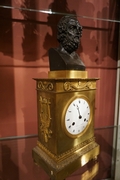 Empire style Clock in gilded and patinated bronze, France around 1800