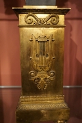 Empire style Clock in gilded and patinated bronze, France around 1800