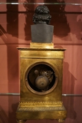 Empire style Clock in gilded and patinated bronze, France around 1800