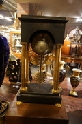Empire style Clock in bronze , France Early 19th Century