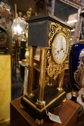 Empire style Clock in bronze , France Early 19th Century