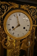 Empire style Clock in bronze , France Early 19th Century