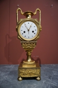 Empire style Clock in gilded bronze, France Early 19th Century