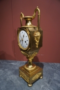 Empire style Clock in gilded bronze, France Early 19th Century