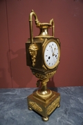 Empire style Clock in gilded bronze, France Early 19th Century