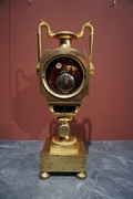 Empire style Clock in gilded bronze, France Early 19th Century