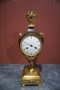 Empire style Clock in gilded bronze, France Early 19th Century