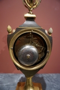 Empire style Clock in gilded bronze, France Early 19th Century