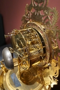 Empire style Clock in gilded bronze, France Early 19th Century