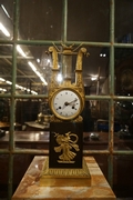 Empire Lyre style clock in gilded bronze, France 18th century