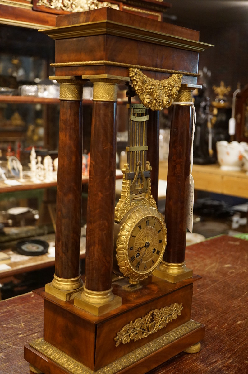 French mahogany mystery portico clock