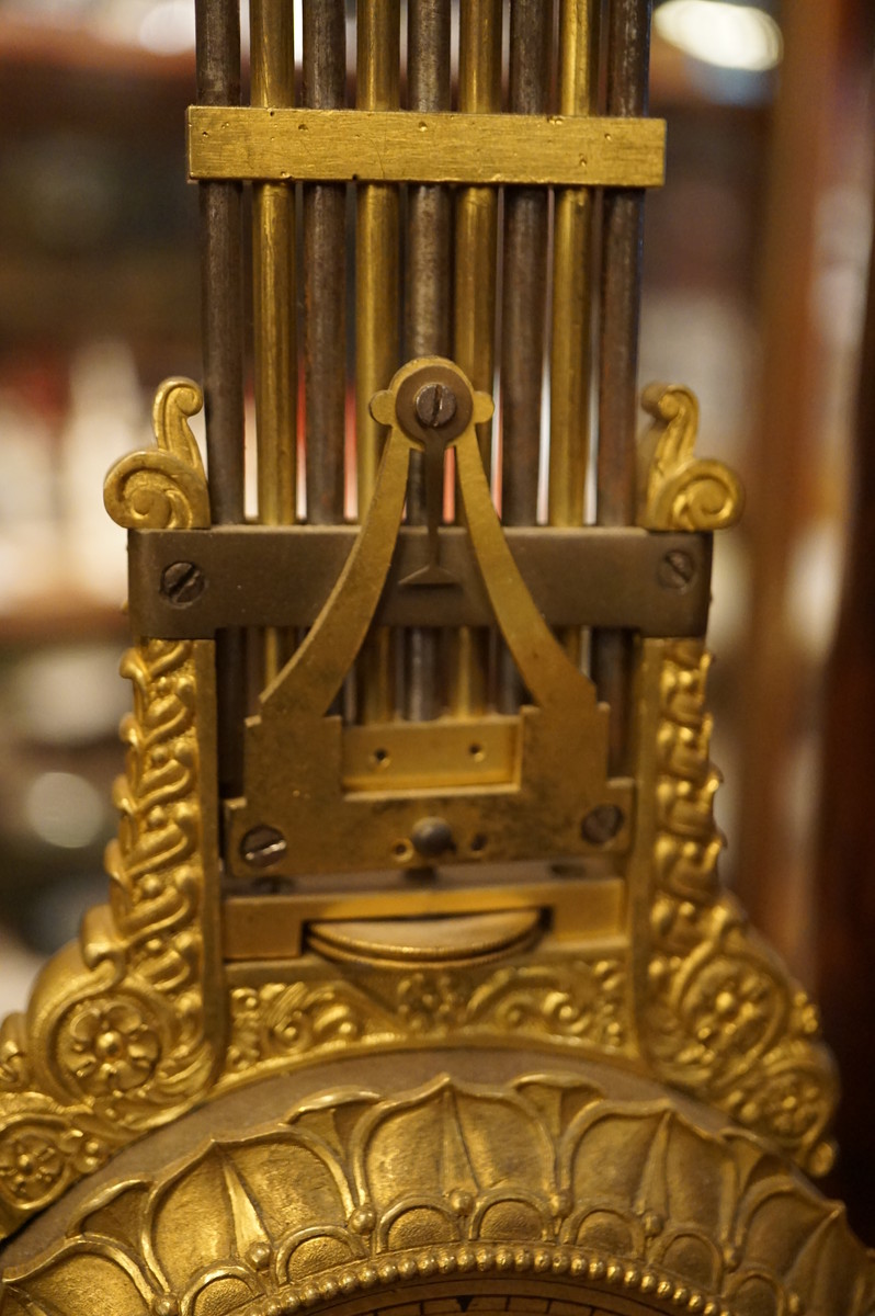 French mahogany mystery portico clock