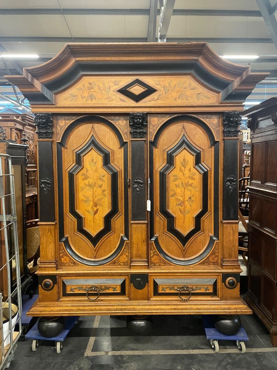 German oak cabinet with marquetry around 1900, 200x65x238H cm 