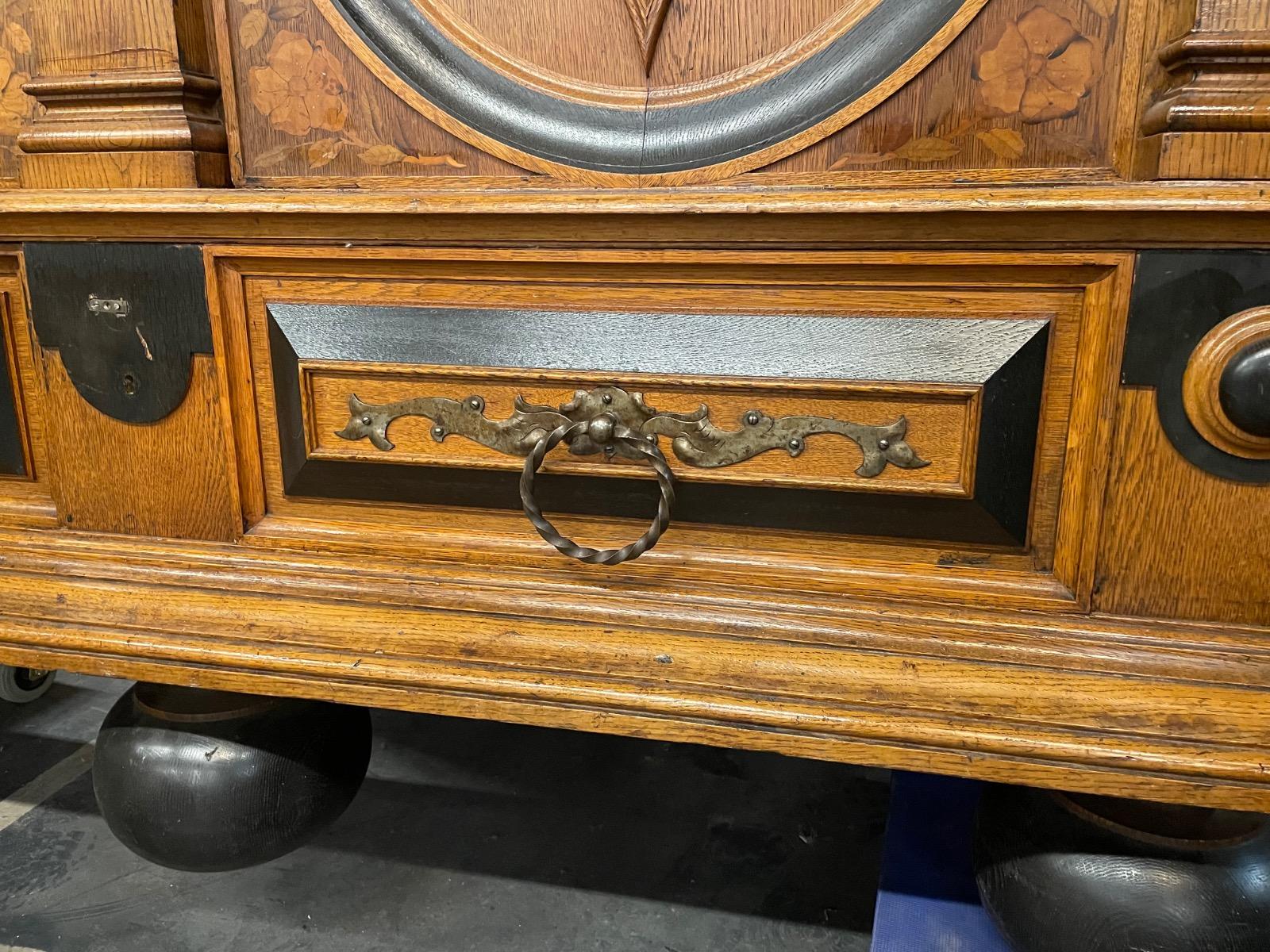 German oak cabinet with marquetry around 1900, 200x65x238H cm 