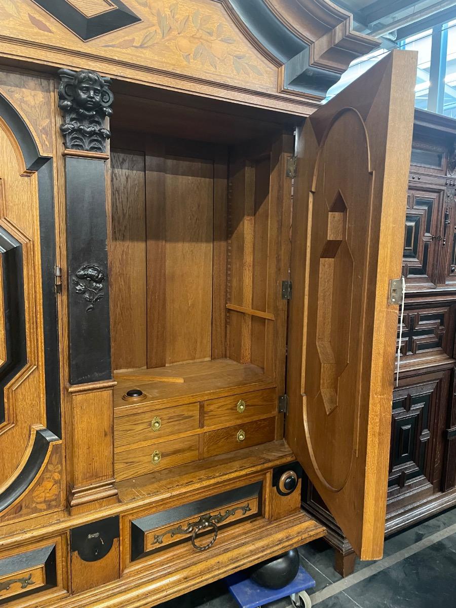 German oak cabinet with marquetry around 1900, 200x65x238H cm 