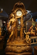 Grandfather clock in walnut, Italy first half 20th C.