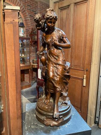 Impressive bronze “secret de l’amour” by carlier on rotating base. 84 cm tall