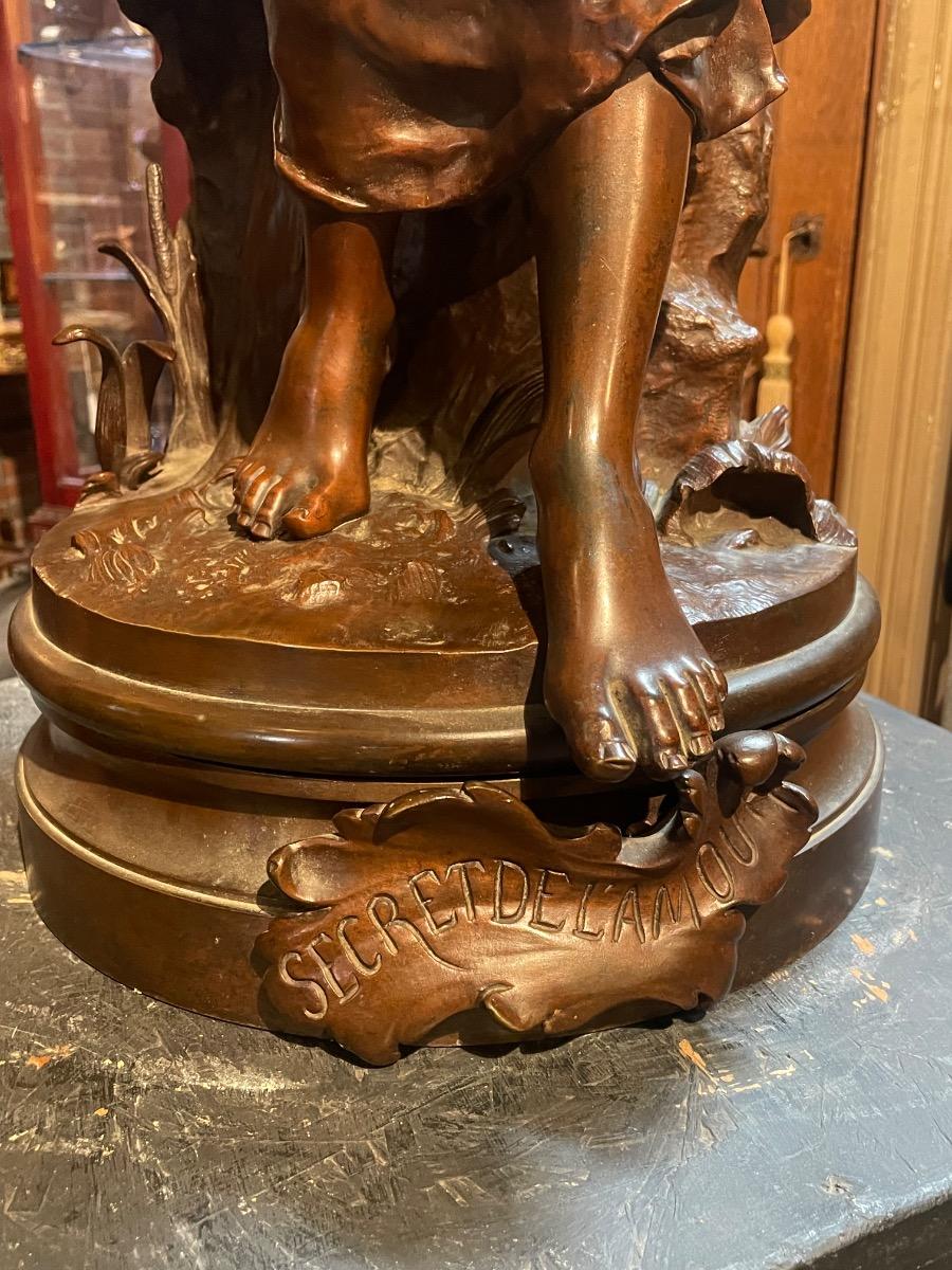 Impressive bronze “secret de l’amour” by carlier on rotating base. 84 cm tall