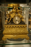 Louis Philippe style Clock in gilded bronze, France 19th century