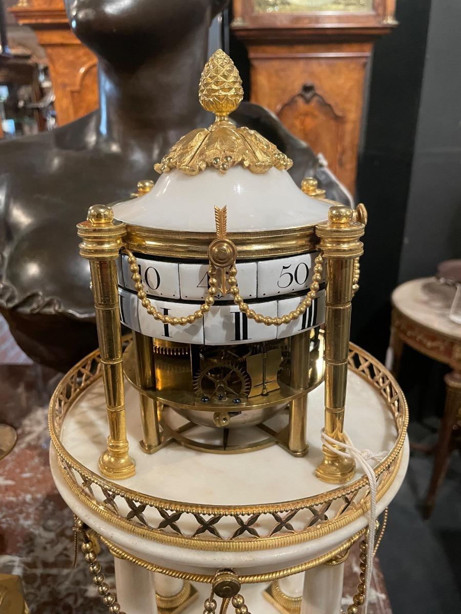 Louis XVI “circles tournants” table clock. 47 cm high