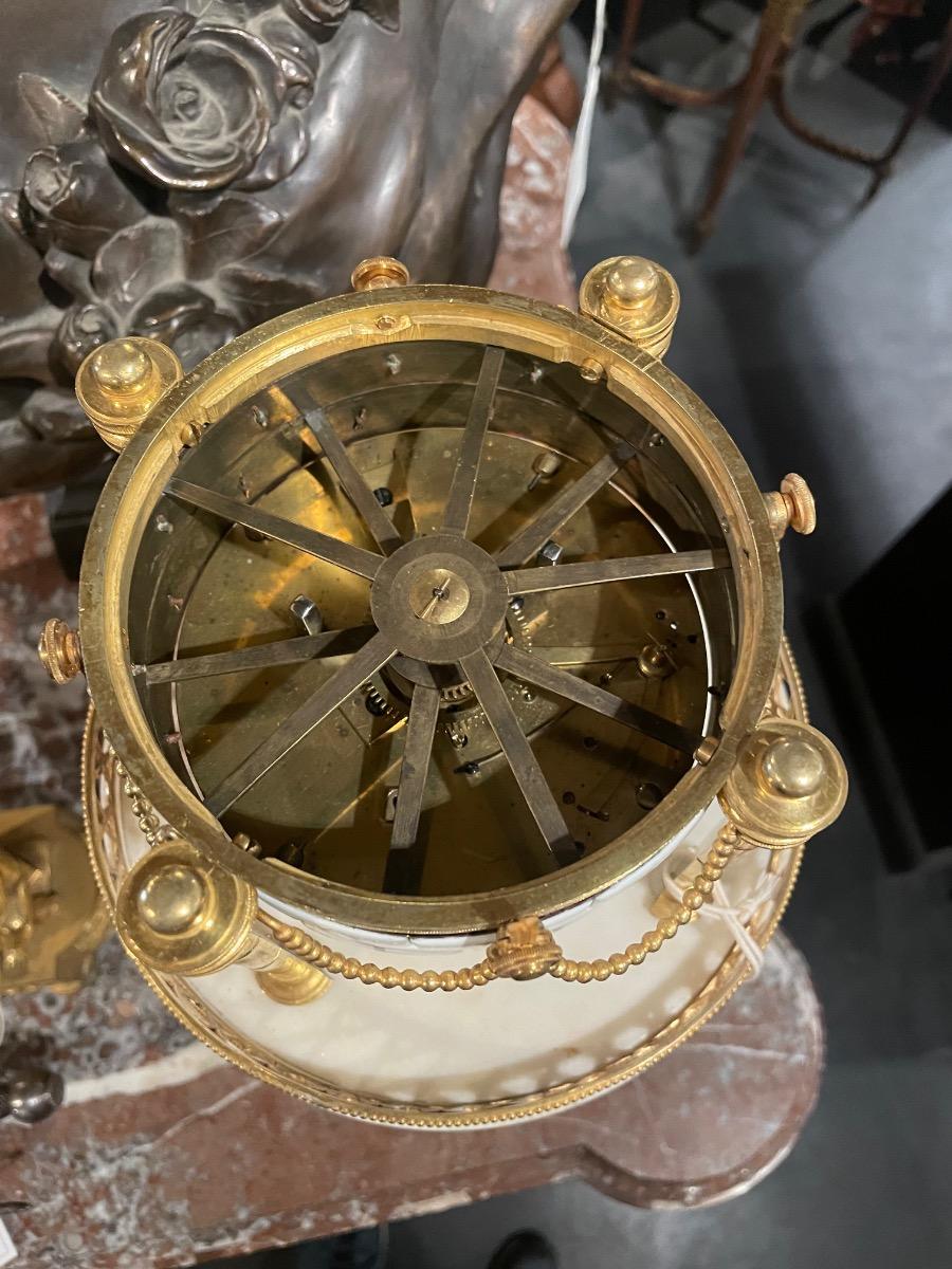 Louis XVI “circles tournants” table clock. 47 cm high