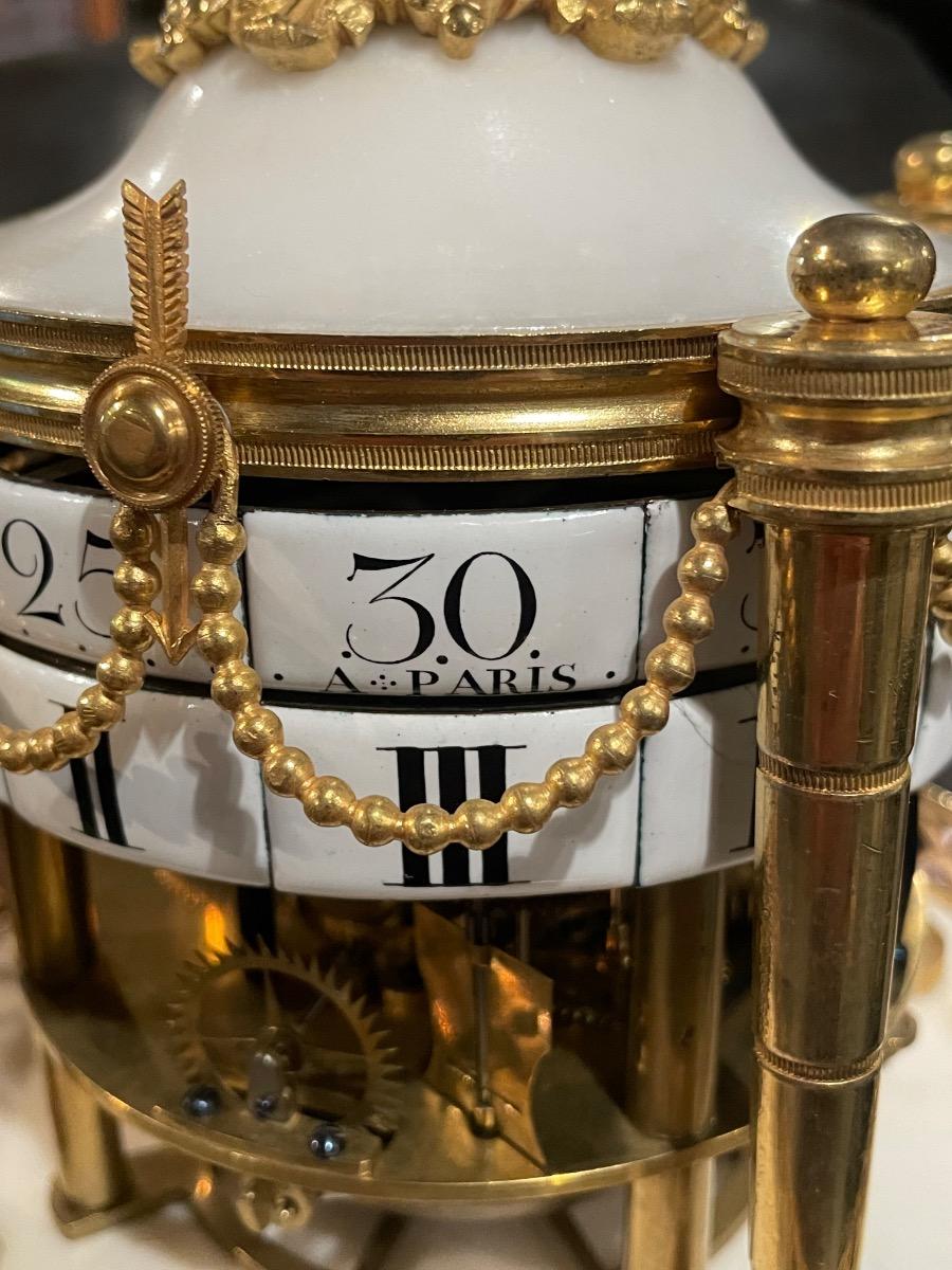 Louis XVI “circles tournants” table clock. 47 cm high