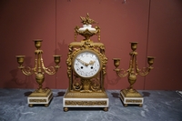 Louis XVI style Clock set in gilded bronze, France 2nd half 20th C.