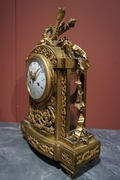 Louis XVI style Clock set in gilded bronze, France 2nd half 19th C.